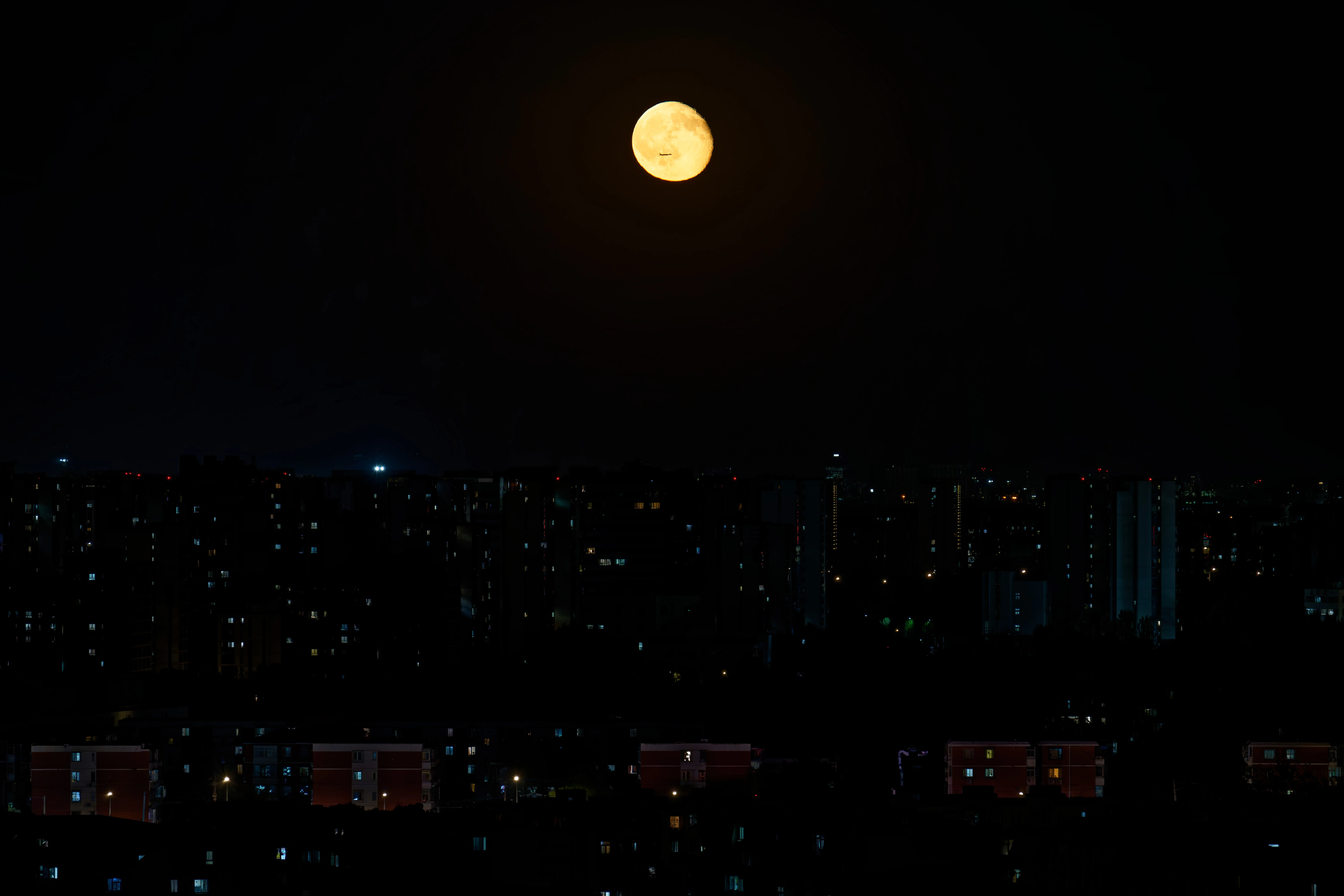The earlier transit above the Beijing cityscape